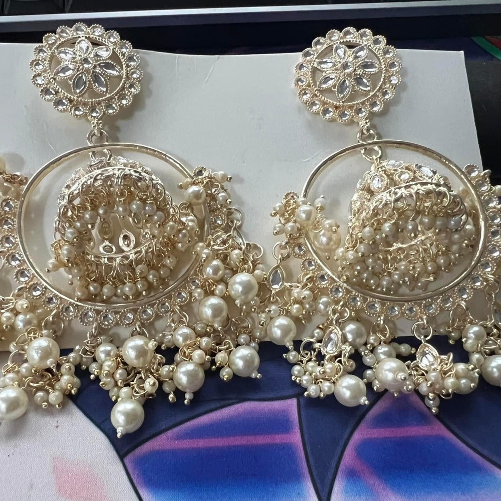 Indian jhumka earrings. Not very heavy but not super light
